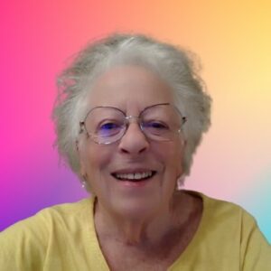 Smiling elderly woman with glasses against a vibrant gradient background.
