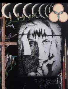 Black and white mural of a face with abstract lines and patterns.