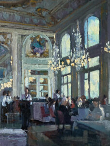 Elegant restaurant interior with diners and large windows letting in natural light.