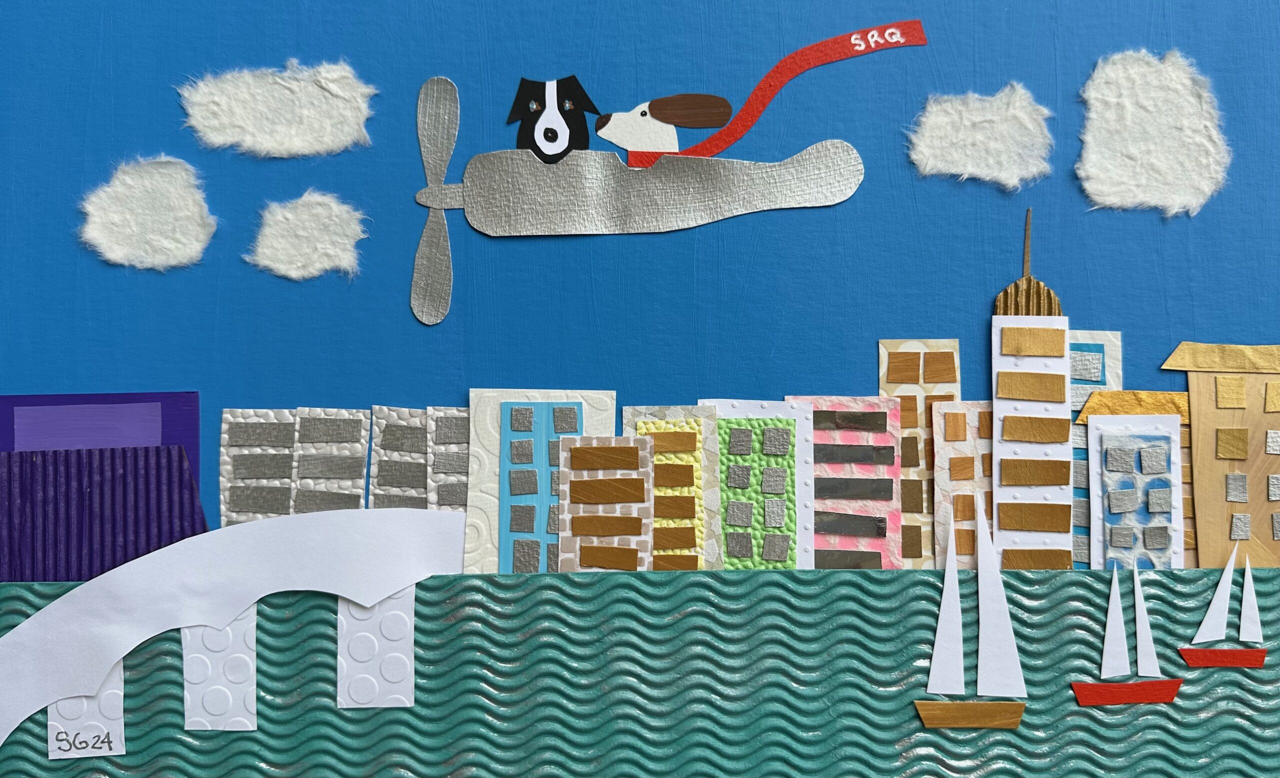 A dog flies a plane with a scarf over a cityscape and water.
