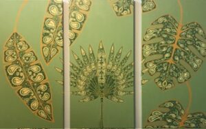Artistic wall panels featuring intricate peacock feather designs in green and gold.