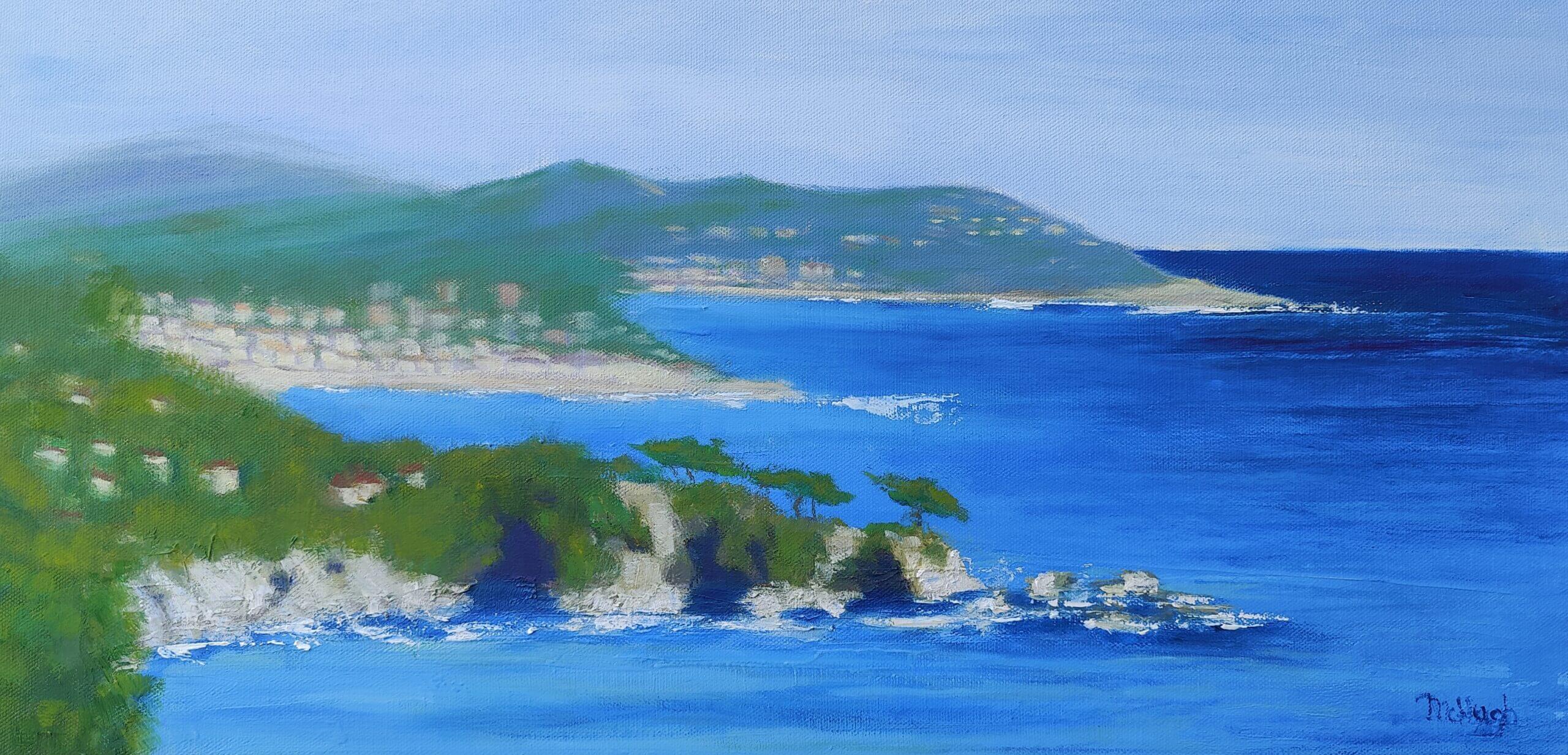 A serene coastal landscape with blue waters and green hills.