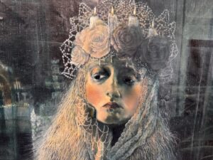 A surreal portrait of a woman with lace and floral headpiece.