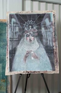 Ethereal portrait of a woman in a headdress with intricate details.