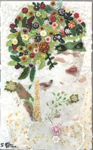 Abstract floral face with colorful flower hair.