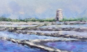 Landscape with tower and water reflections.