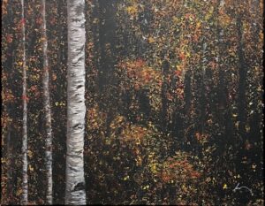 Birch trees in a colorful autumn forest.